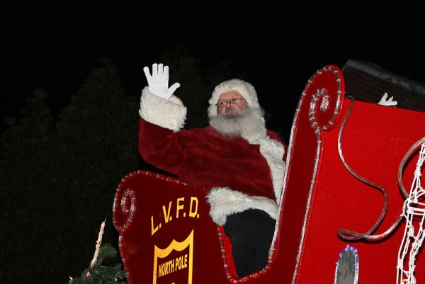 Santa Claus is a regular visitor to the Lemoore Christmas Parade. The annual parade will expand this year to meet the challenge of more spectators.